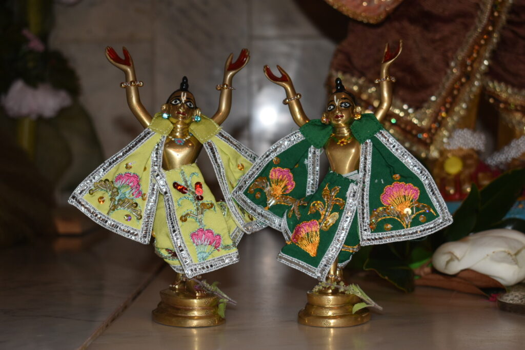 Small Gaura Nitai Deities in yellow and green.